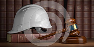 Labor law concept. Gavel  with concstruction hard hat and books