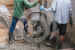 Labor work concrete with cart