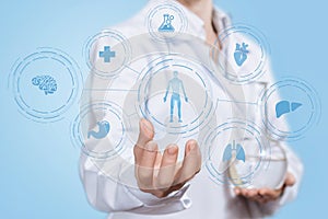 A laboratorian assistant showing a medical science development structure photo