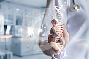 Laboratory assistant shows DNA molecule with question marks