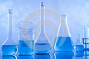 Laboratory beakers,Science experiment, blue background