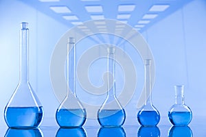 Laboratory beakers,Science experiment, blue background