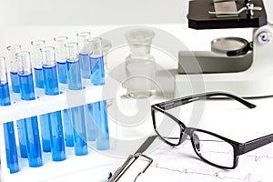 Laboratory, chemistry and science concept on white background