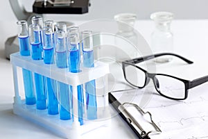 Laboratory, chemistry and science concept on white background