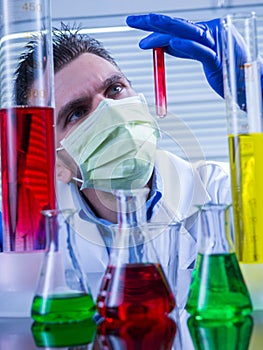 Laboratory equipment, Man in the lab experimenting