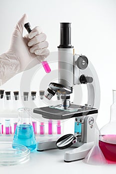 Laboratory Equipment: microscope, test tubes
