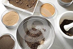 Laboratory equipment for pulverizing and sieving of soil samples on light table