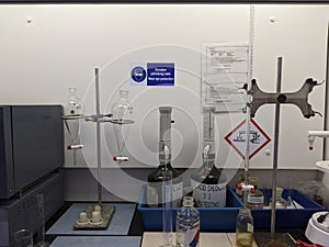 Laboratory equipment to test palm oil in a fume hood in a factory