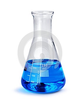 Laboratory glass beaker with blue liquid sample