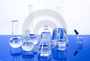 Laboratory Glassware in blue background