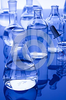 Laboratory Glassware in blue background