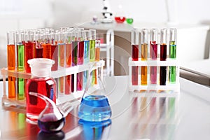 Laboratory glassware with color liquids on . Solution chemistry