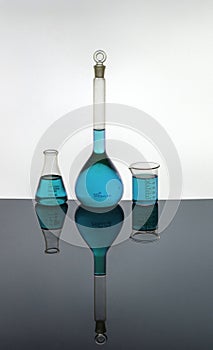 Laboratory glassware containing Blue solutions