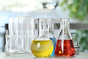 Laboratory glassware with different liquid samples