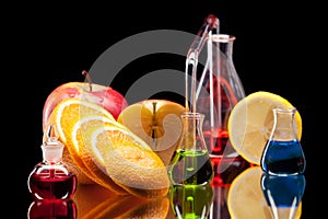 Laboratory glassware with fruits