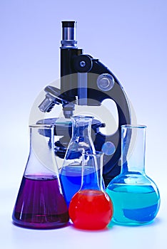 Laboratory glassware and microscope