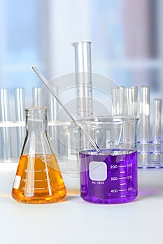 Laboratory Glassware on White Table