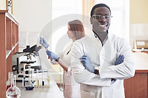 Laboratory laboratories conduct experiments in a chemical laboratory in transparent flasks. Output formulas