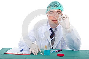 Laboratory man examine oil capsule