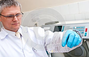 Laboratory man with test tubes