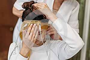 In Laboratory young woman Wearing Brainwave Scanning Headset Sits in a Chair with Closed Eyes. In the Brain Neurological Research