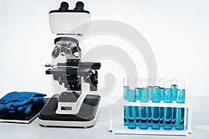 Laboratory microscope of healthcare and medicine researcher scientist with lab equipment tools on the table., Science technology