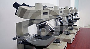 Laboratory microscopes stacked together