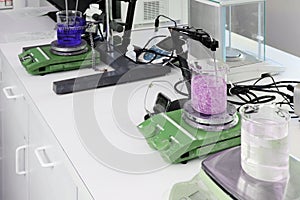 Laboratory mixing equipment with temperature probes.