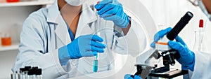 Laboratory researcher team advance healthcare with scientific expertise. Rigid