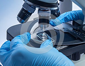 Laboratory Scientist Using Microscope for Research Analysis