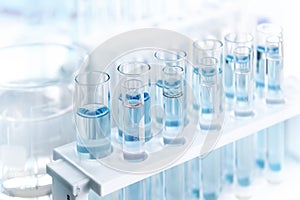 Laboratory tubes with blue liquid in the laboratory, available for scientists working in laboratories, tools for laboratory scient