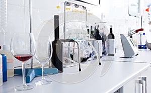 modern laboratory of winery. Checking acidity of wine and organoleptic characteristics