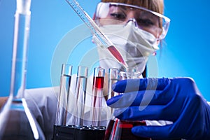 Laboratory, The Woman in the lab experimenting photo