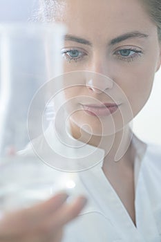 Laboratory worker holding test tube