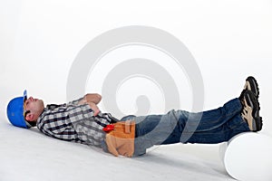 Laborer laid on the floor photo