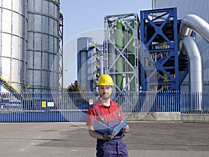 Laborer outside a factory