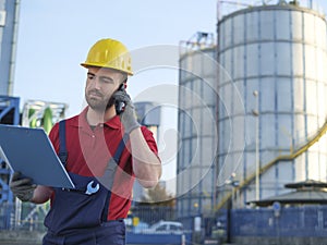 Laborer outside a factory