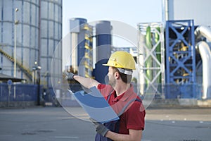 Laborer outside a factory