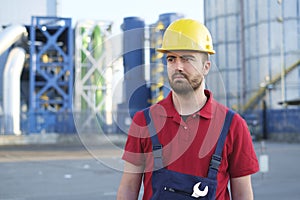 Laborer outside a factory working