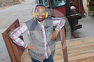 Laborer posing in yard