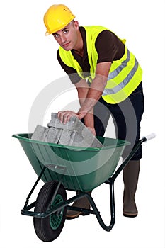 Laborer with a wheelbarrow