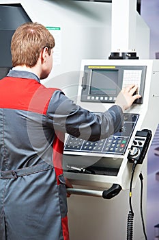 Laborer worker with machining tool center