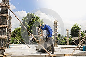 Laborer working on a construction building site