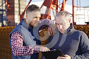 laborers outside a factory