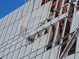 Laborers in window frame