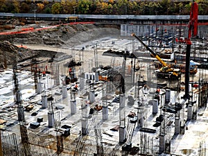 Laborers working on modern construction site