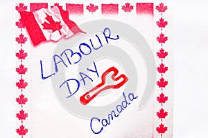 Labour day Canada handwriting on paper with Canada flag. Writing text on memo post reminder. Bucharest, Romania, 2020