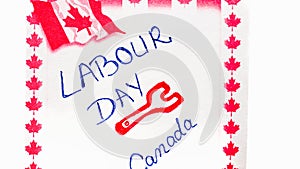 Labour day Canada handwriting on paper with Canada flag. Writing text on memo post reminder. Bucharest, Romania, 2020