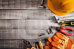 Labour Day,  Many handy tools on wooden background texture