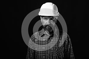 Labour and heavy industry concept. Builder or repairer with beard